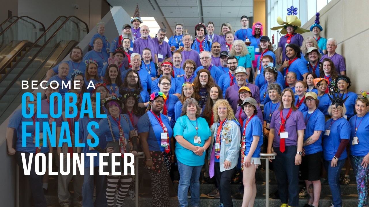 Large group photo of Destination Imagination volunteers at Global Finals 2024.